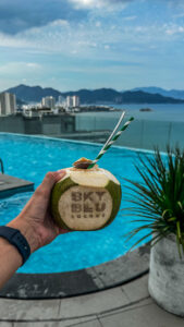 Coconut drink at rooftop pool bar