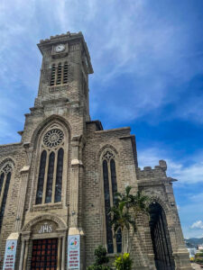 Vietnam soaring stone Gothic church on hilltop