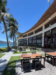 Wooden deck and ocean view from Sea Breeze at Hon Tam Island sunset dinner