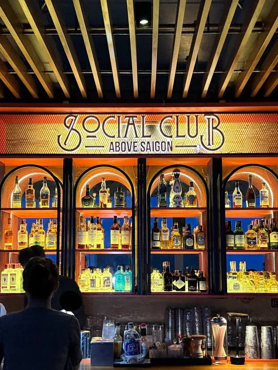 Smart casual dressed guests enjoying the evening at Social Club Rooftop Saigon