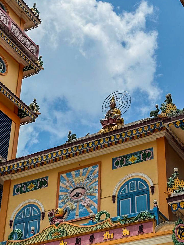 Worshippers chanting inside Cao Dai Temple Da Lat during a service