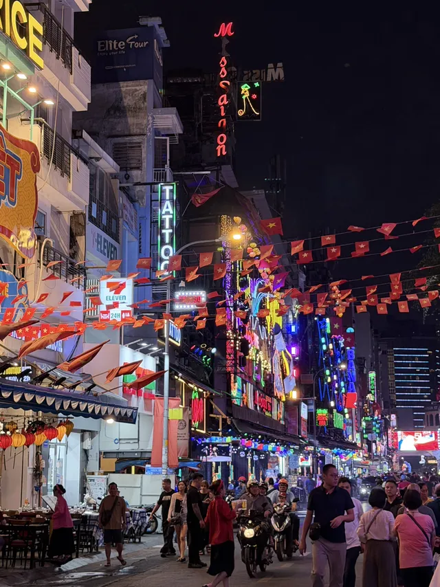 Crowds of people partying on Bui Vien Walking Street at night