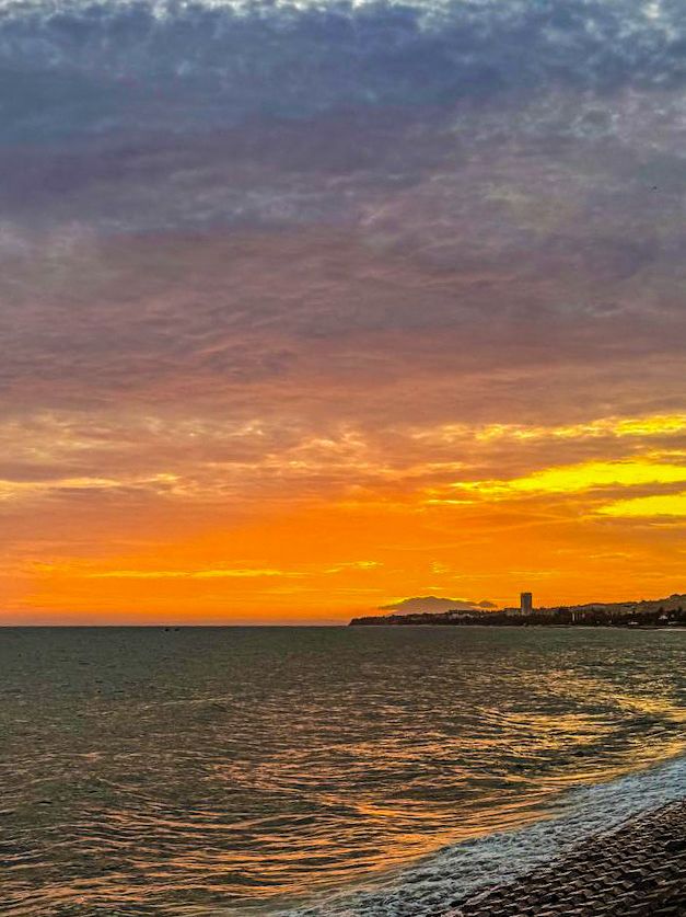 Sunset view over the ocean from sunset food court Mui Ne