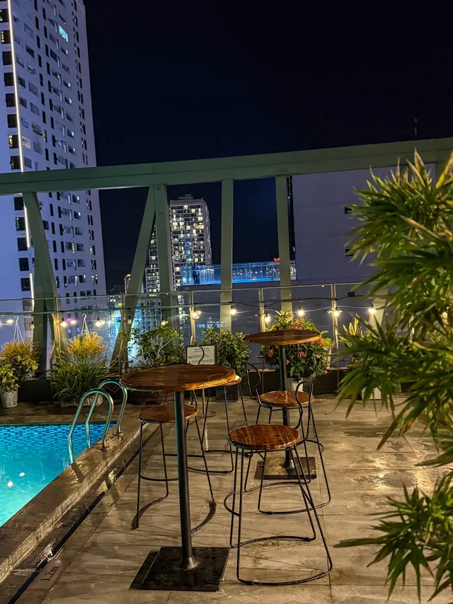 Poolside loungers with no crowds at Art Nest Rooftop Nha Trang