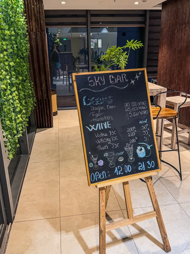 Rooftop bar and indoor lounge at Art Nest Rooftop Nha Trang