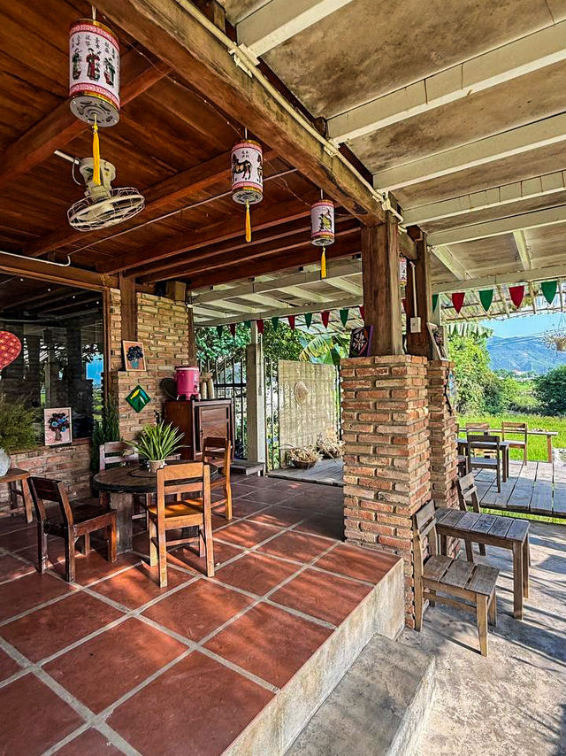 Wooden walkway above water at rice field cafe nha trang