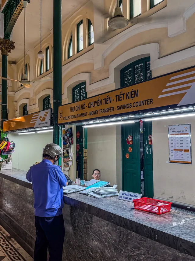 Portrait of Ho Chi Minh at the far end of Saigon Central Post Office hall