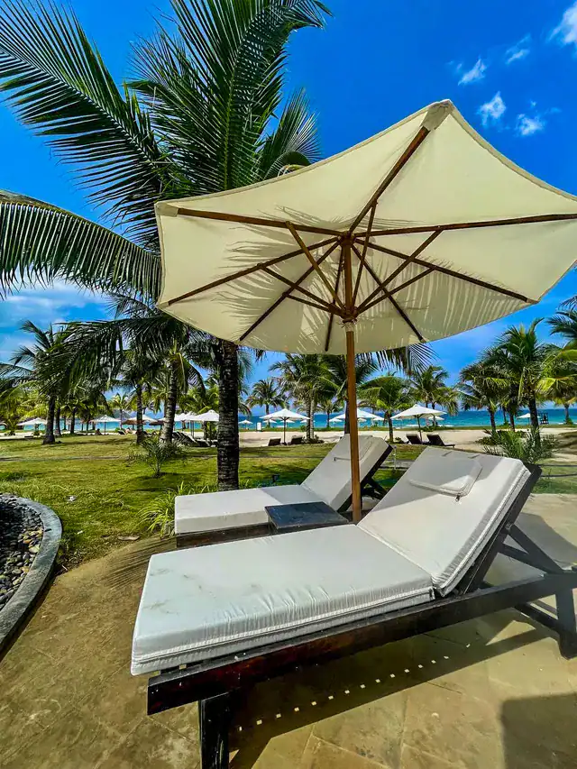 Amiana Resort Nha Trang private beach with calm bay and white sand
