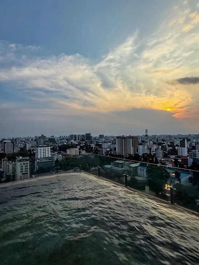 Golden sunset view from the 24th floor of Social Club Rooftop Saigon
