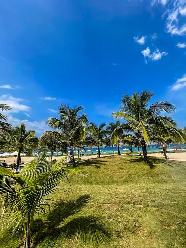Amiana Resort Nha Trang water sports center and sun loungers by the lagoon