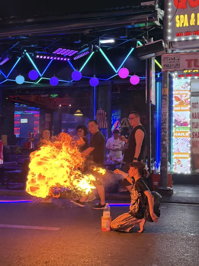 Fire dancer performing on Bui Vien Walking Street
