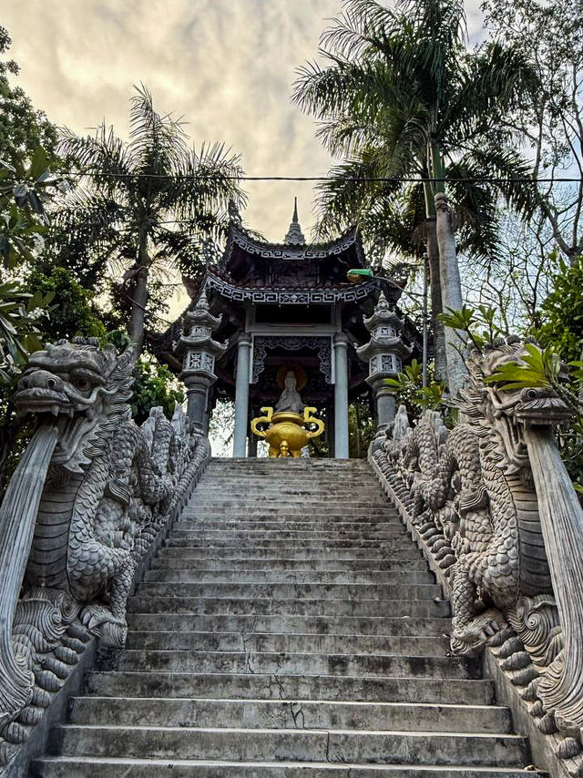 Dragon staircase leading up to the peaceful 48m buddha vietnam hilltop pagoda