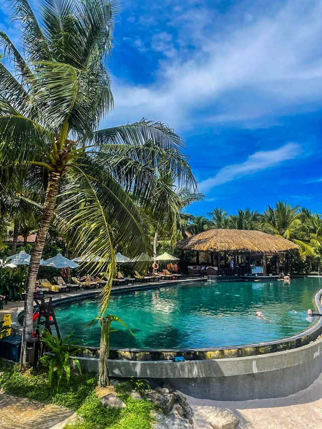 Crystal clear water and soft white sand at luxury day pass Amiana Resort Nha Trang