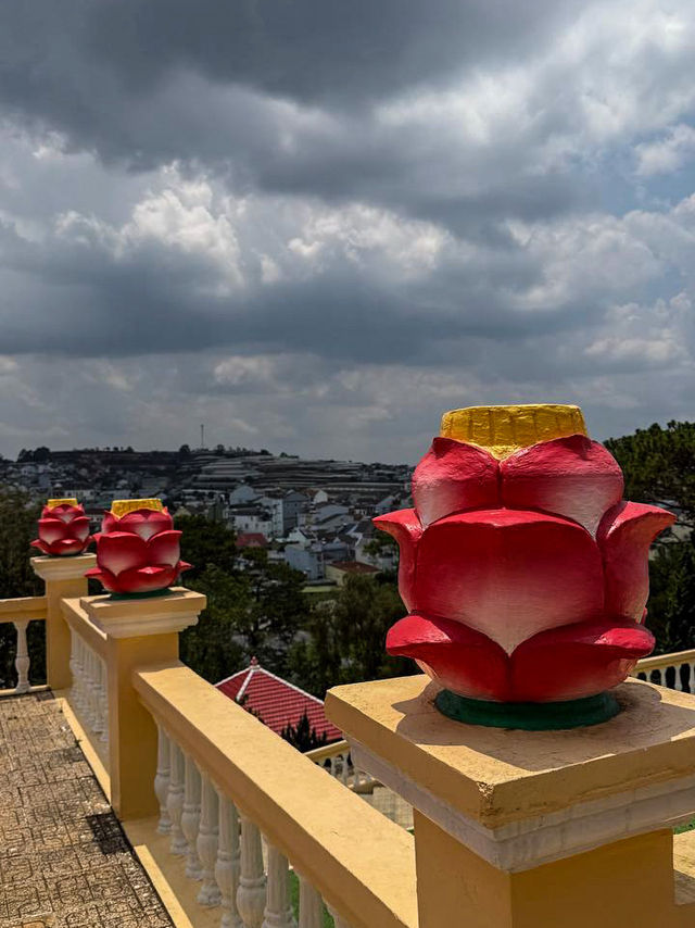 Entrance gate of Cao Dai Temple Da Lat with the Eye of God symbol
