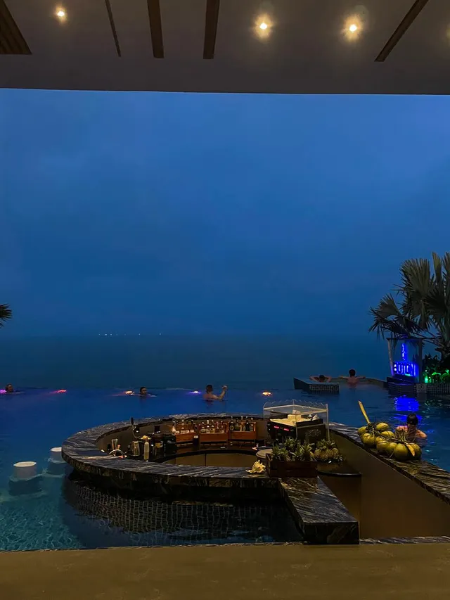 Sunset view from the rooftop pool of Boton Blue Hotel Nha Trang