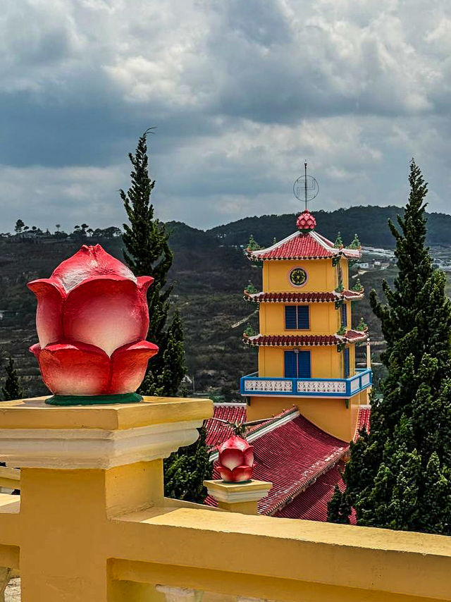 Entrance gate of Cao Dai Temple Da Lat with the Eye of God symbol
