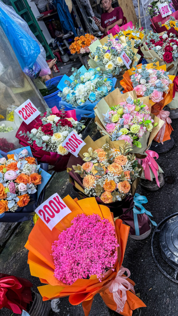 Ho Thi Ky Flower Market roses and orchids at dawn Saigon