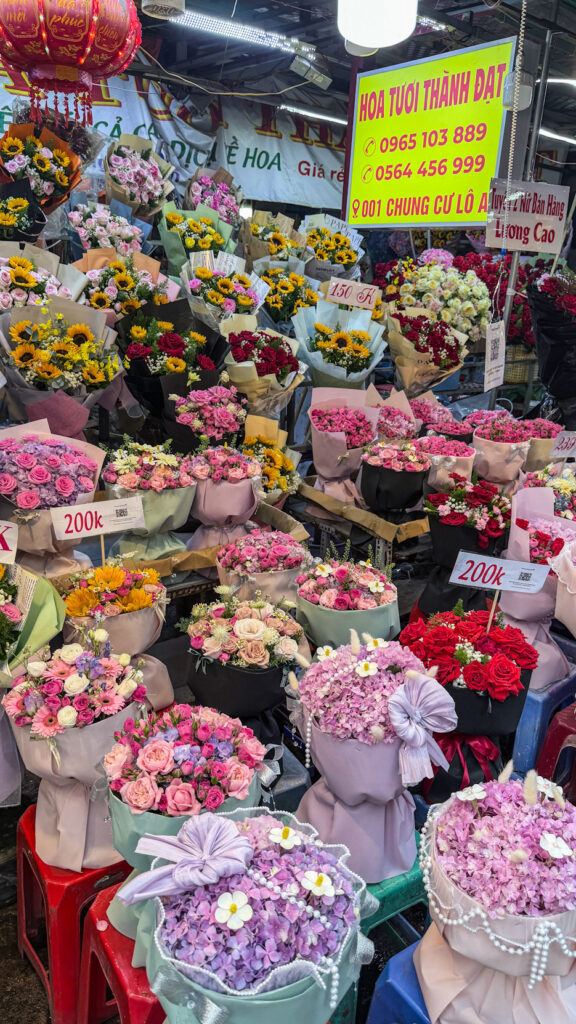 Ho Thi Ky Flower Market roses and orchids at dawn Saigon