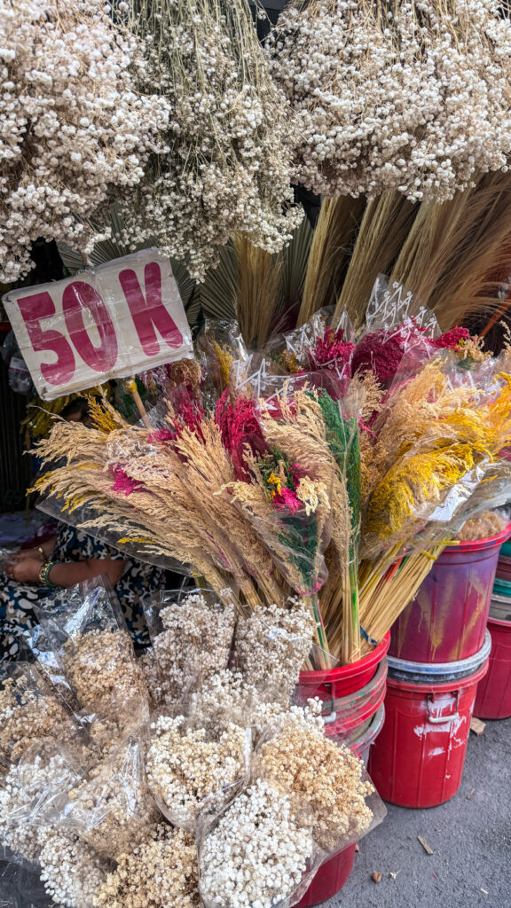 Ho Thi Ky Flower Market roses and orchids at dawn Saigon