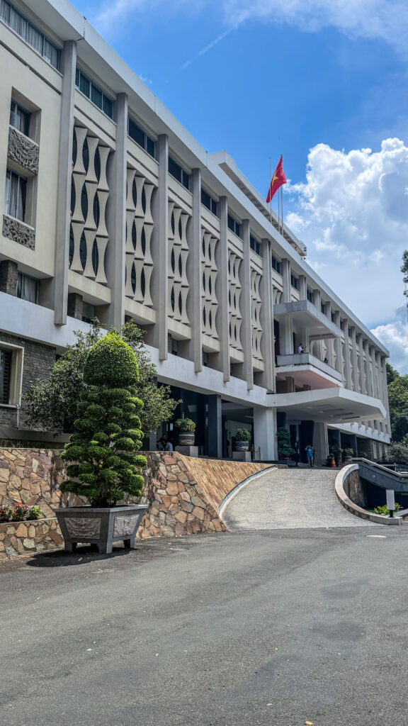 Independence Palace Saigon with UH-1 Huey helicopter and front gate