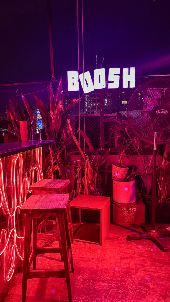 Boosh Rooftop live music and neon view over Bui Vien Saigon
