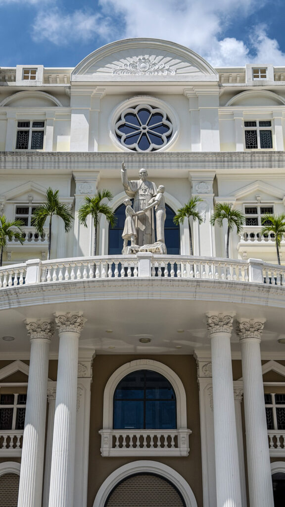 Chi Hoa Church Gothic rose window and stone tower Saigon