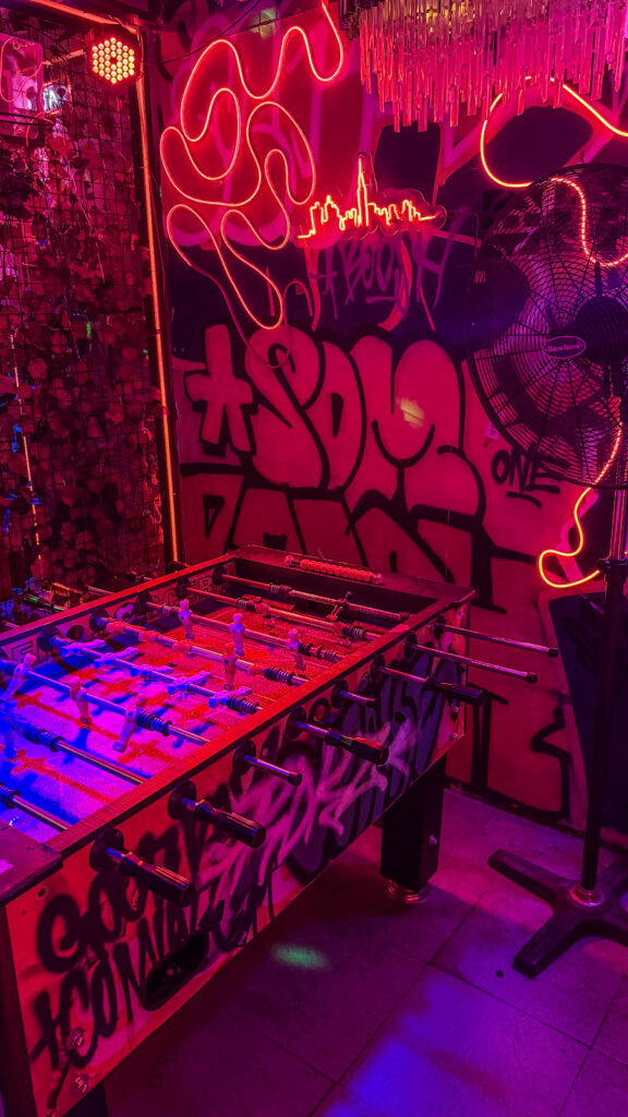 Boosh Rooftop live music and neon view over Bui Vien Saigon