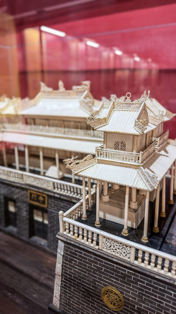 Vietnam History Museum Saigon pagoda-style building with bronze drums and Cham sculptures