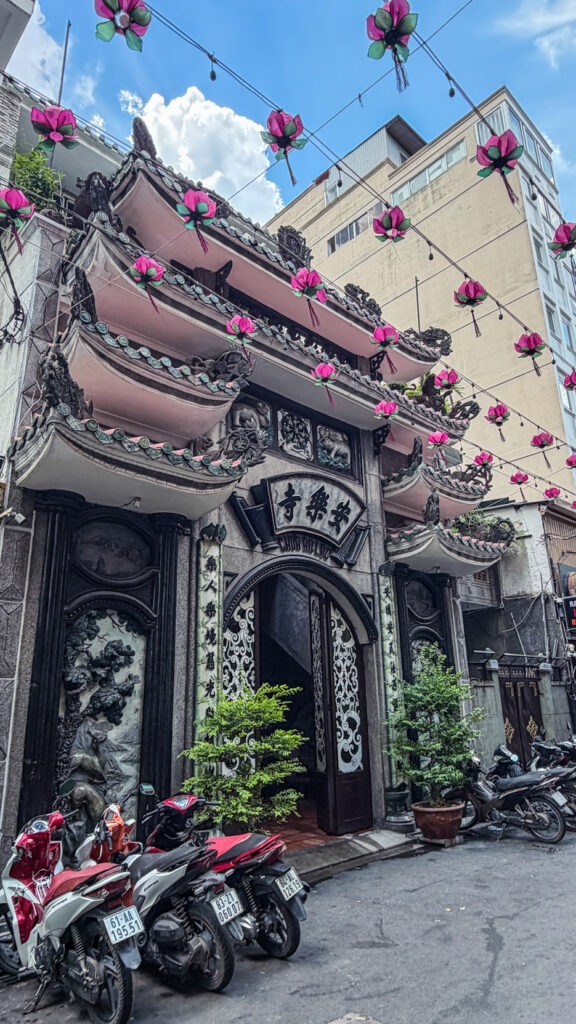 Chứa An Lạc quiet temple street with Buddhist pagoda and incense Saigon