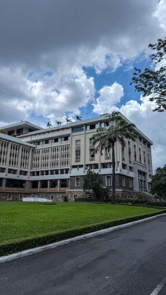 Independence Palace Saigon with UH-1 Huey helicopter and front gate
