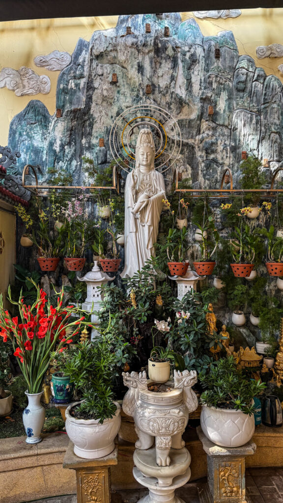 Nghia Huong Pagoda Quan Am statue and lotus pond Nha Trang Vietnam