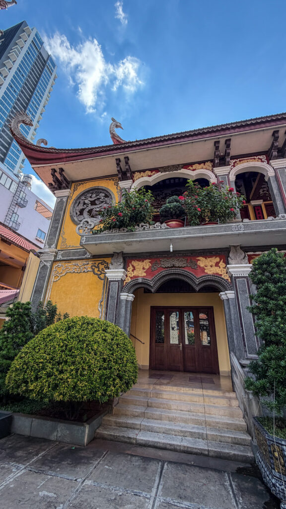 Chùa Lâm Tế courtyard pond and mature trees District 5 Saigon