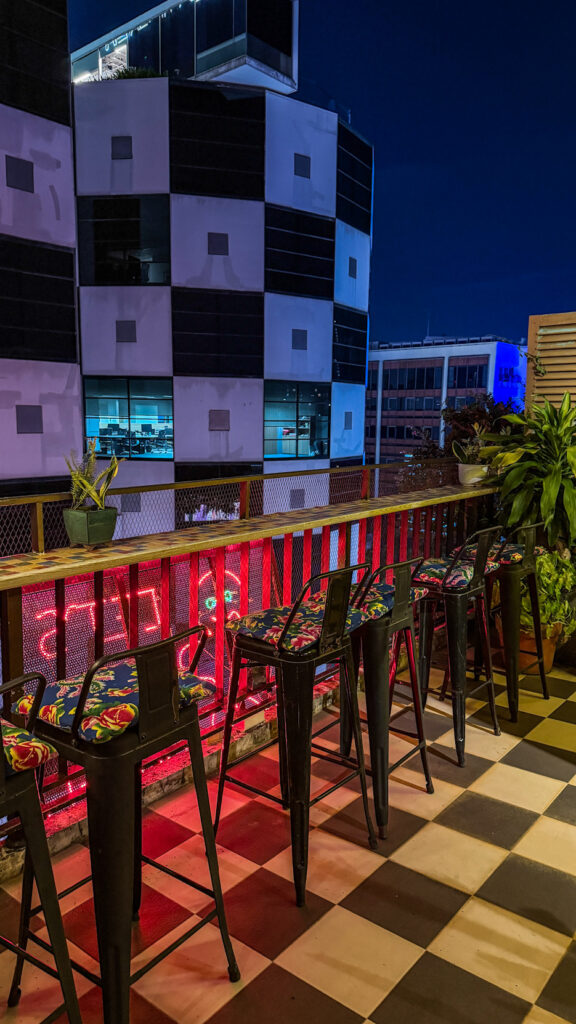 Le'Fê Rooftop poolside terrace and Bitexco Tower view Saigon