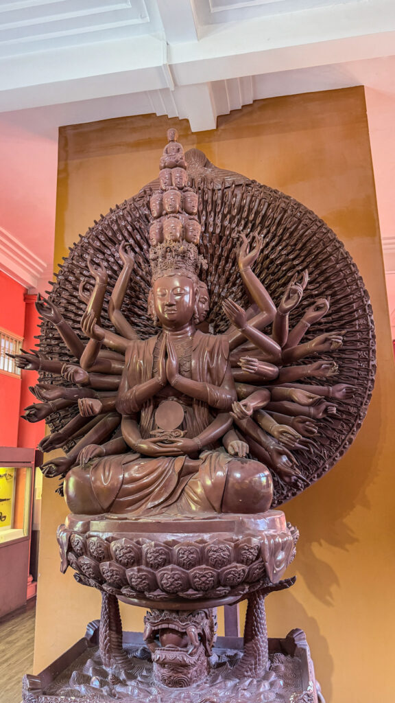 Vietnam History Museum Saigon pagoda-style building with bronze drums and Cham sculptures