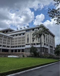 Independence Palace Saigon with UH-1 Huey helicopter and front gate