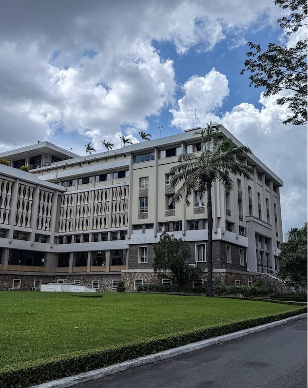 Independence Palace Saigon with UH-1 Huey helicopter and front gate