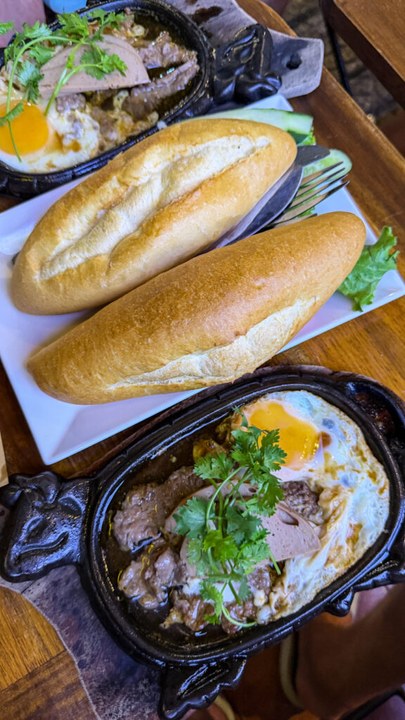 Nhà Việt bánh mì and bò né with free iced tea Da Nang