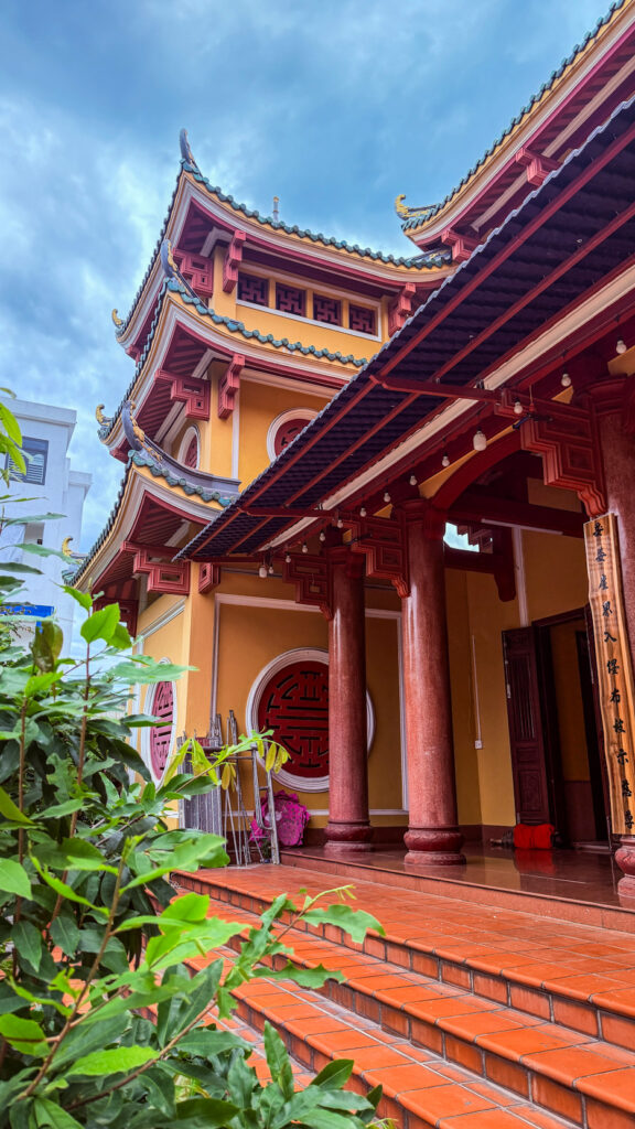Pho Da Temple Quan Am statue on lake and Buddhist university Da Nang