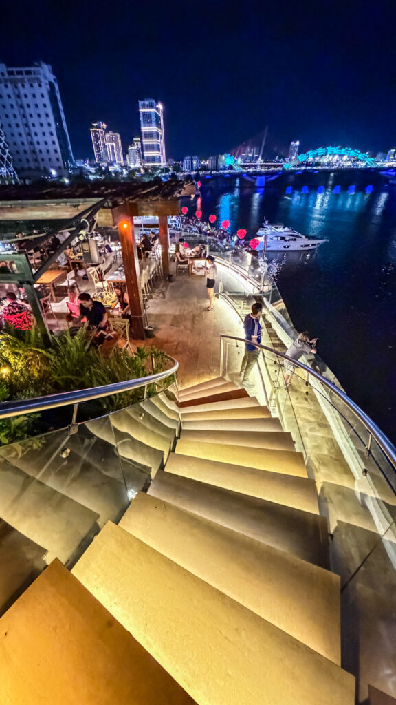 The View restaurant on Happy Yacht with Dragon Bridge fire show at sunset

