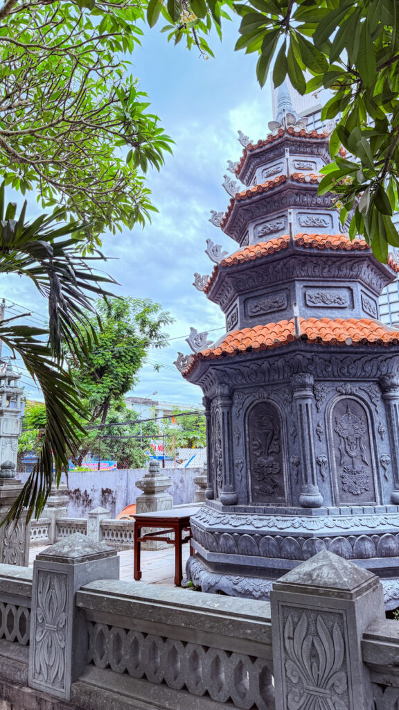 Pho Da Temple Quan Am statue on lake and Buddhist university Da Nang