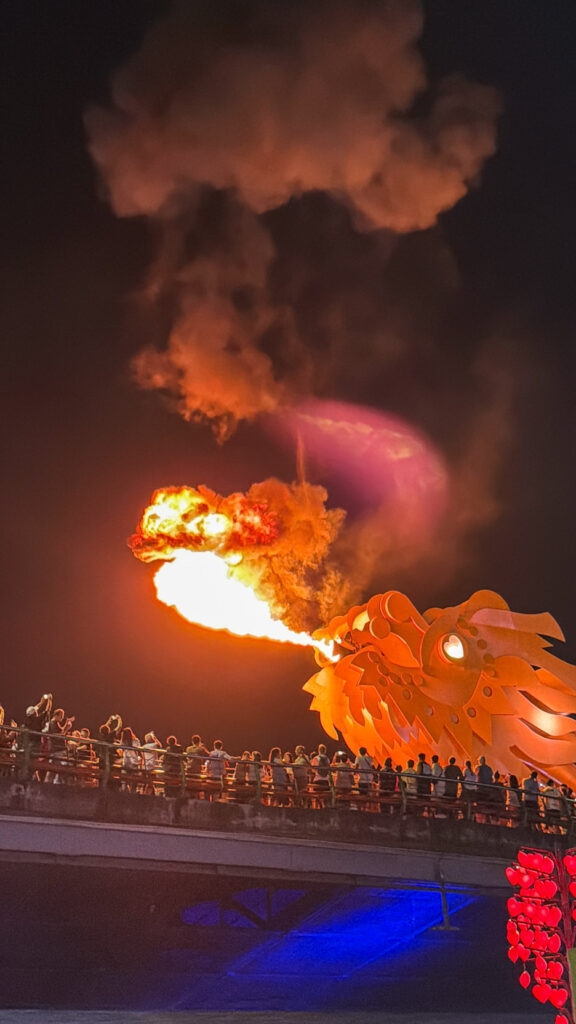 The View restaurant on Happy Yacht with Dragon Bridge fire show at sunset

