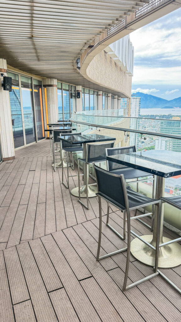 The Sail Hilton Da Nang rooftop with Han River sunset view