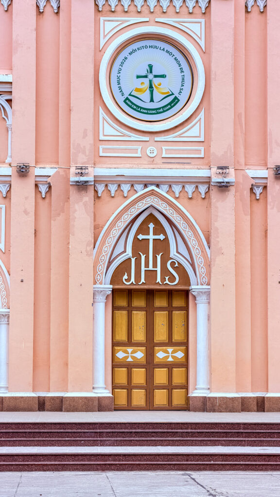 Danang Cathedral pink church with rooster bell tower Da Nang