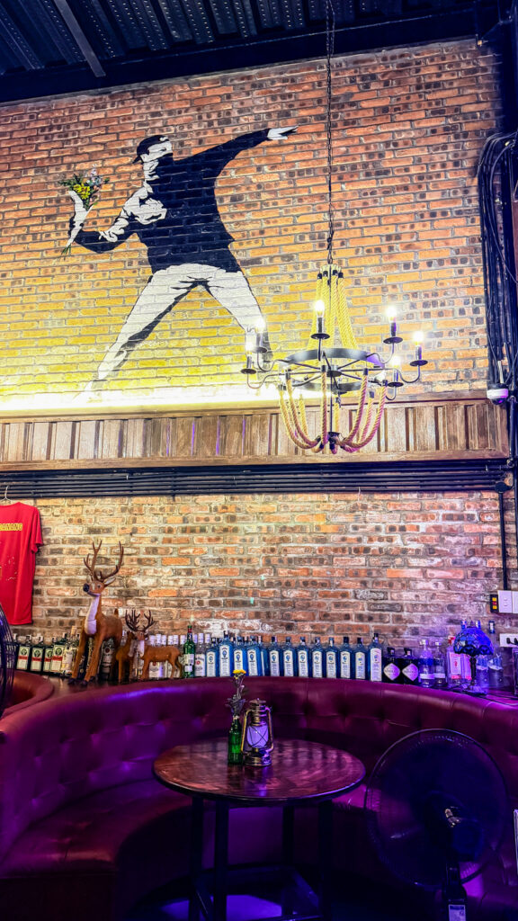 CHEERS PUB & BBQ hidden bar behind bookshelf Da Nang