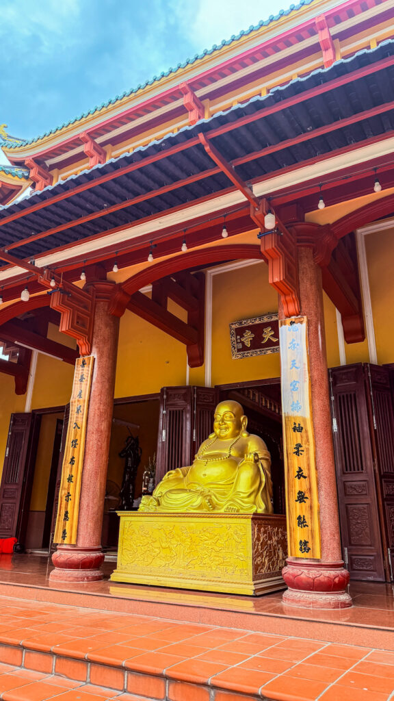 Pho Da Temple Quan Am statue on lake and Buddhist university Da Nang