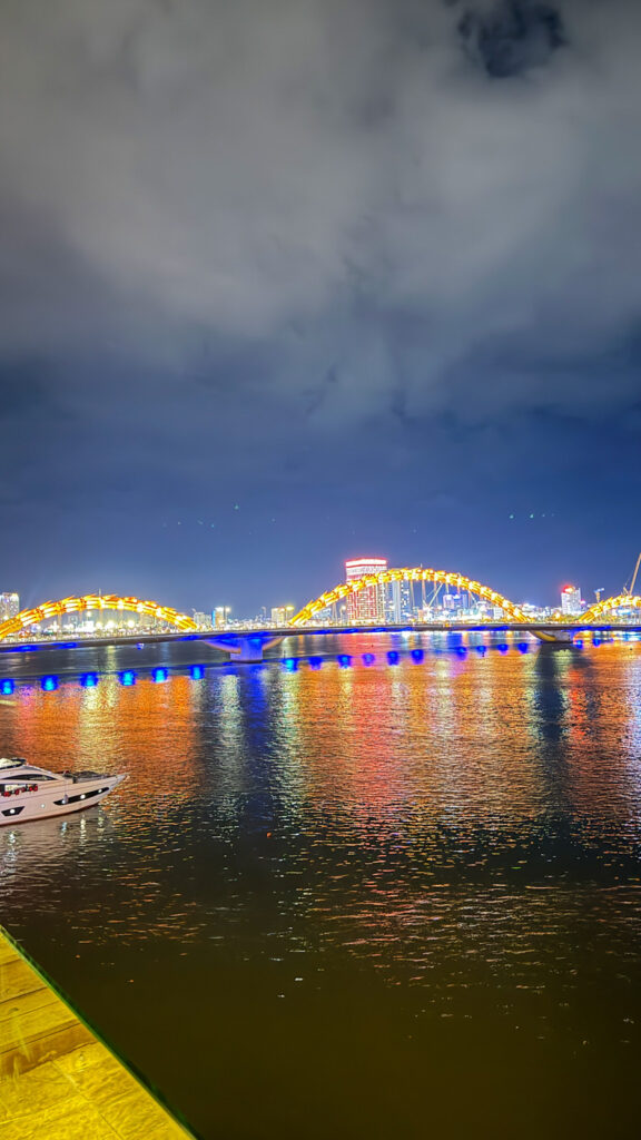 The View restaurant on Happy Yacht with Dragon Bridge fire show at sunset


