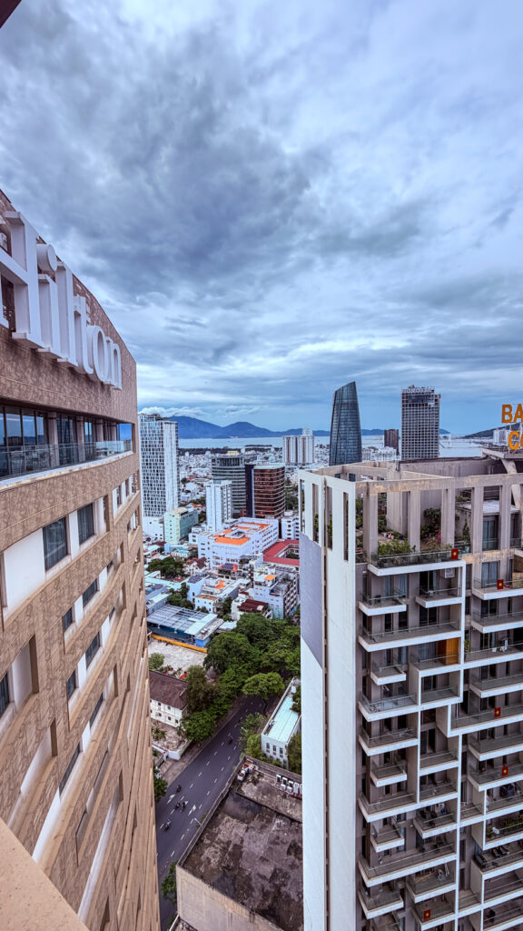 The Sail Hilton Da Nang rooftop with Han River sunset view