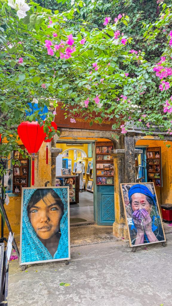 Precious Heritage Museum Hoi An entrance on Phan Boi Chau street with small sign and yellow wall