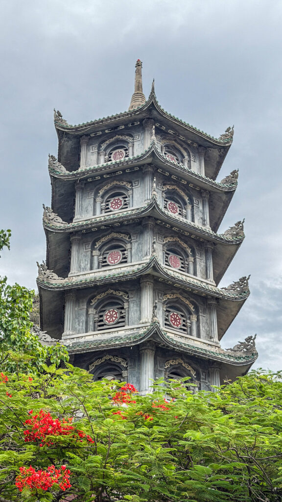 Pagoda courtyard with incense and mountain views in Marble Mountains Vietnam

