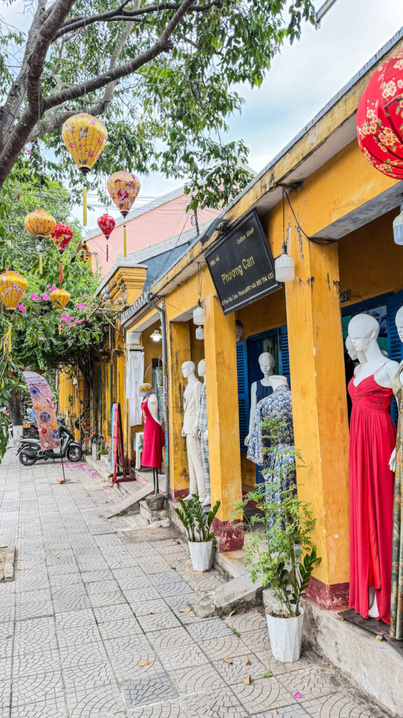 Thu Bon River in Hoi An with traditional wooden boats and old town reflections

